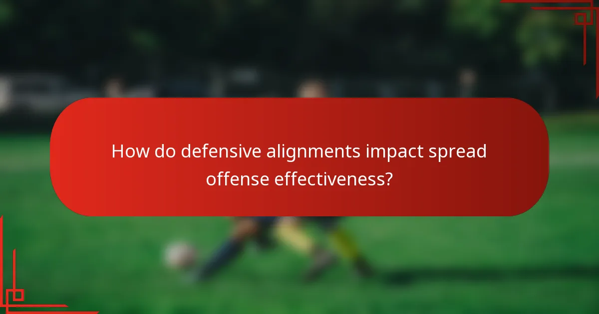 How do defensive alignments impact spread offense effectiveness?