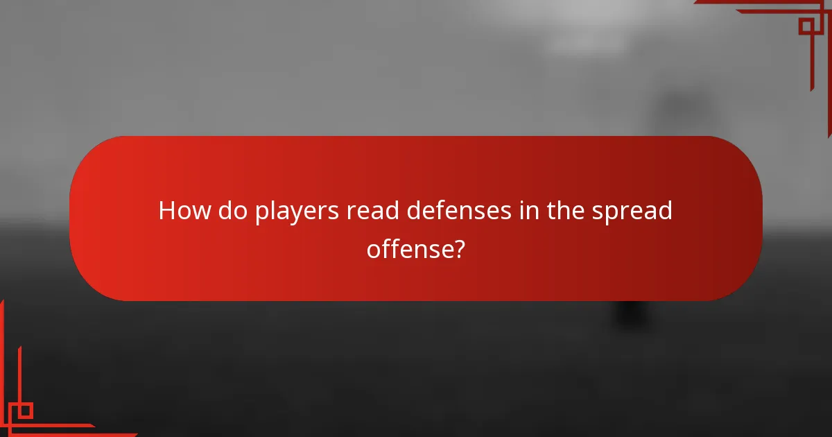 How do players read defenses in the spread offense?